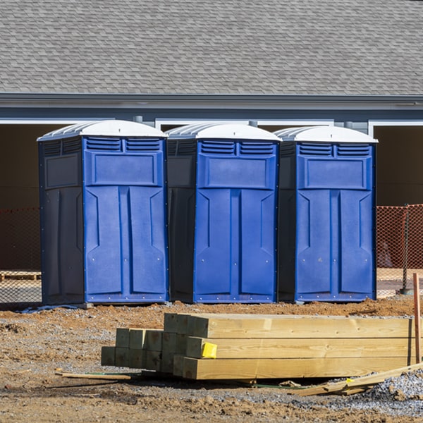 how often are the portable restrooms cleaned and serviced during a rental period in Fairview